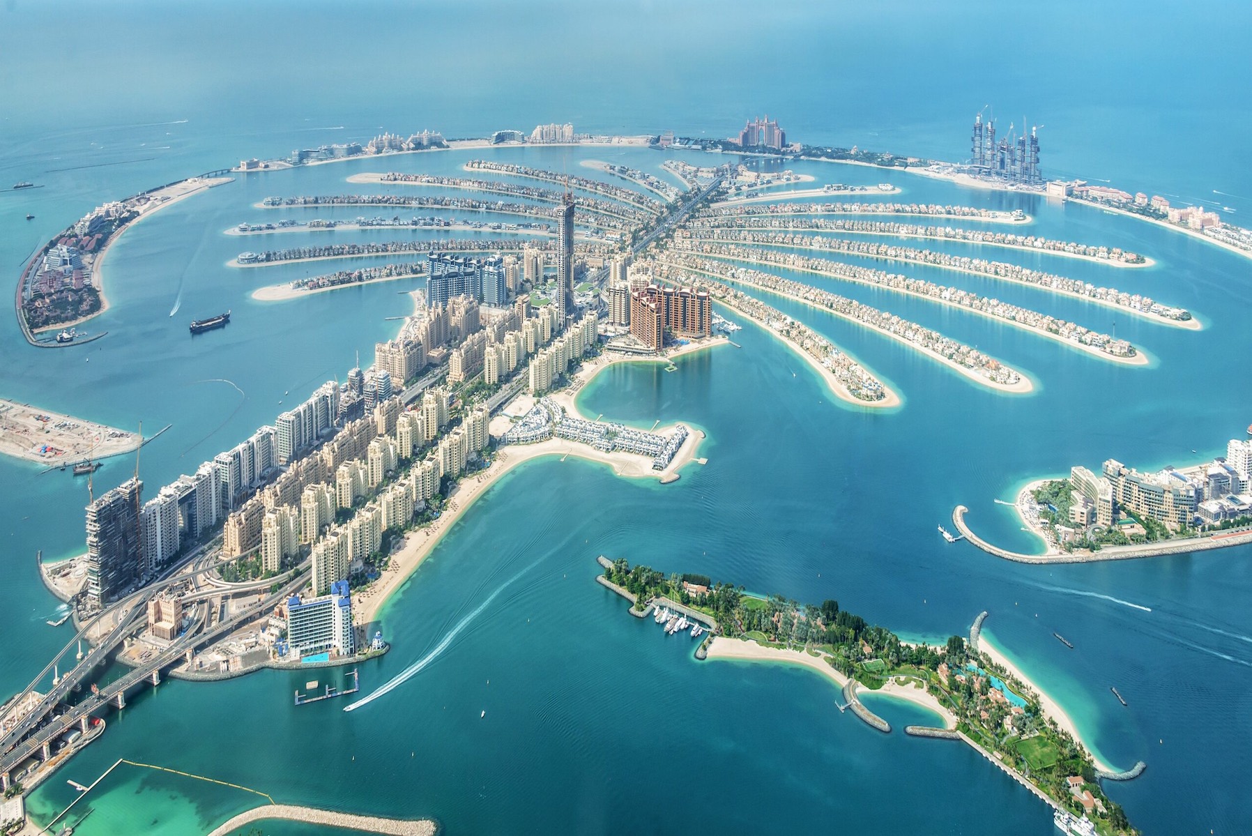 aerial-view-of-dubai-palm-jumeirah-island--united-arab-emirates-1097789900-b6c44835cb3945f481427a612f2cdd0b